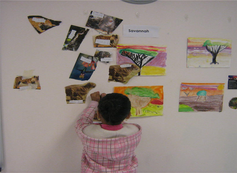 Student working on life science assignment in Art class 